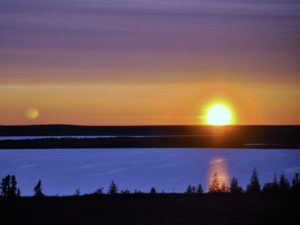 Sunset over remote northern Manitoba lake near fly-in caribou lodge